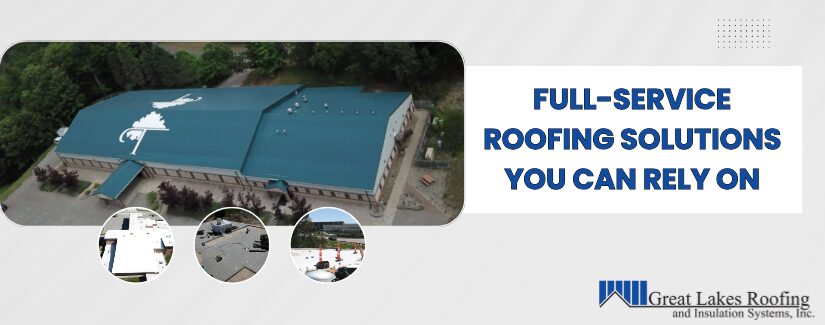 A commercial roof with a message promoting full-service roofing solutions provided by Great Lakes Roofing.